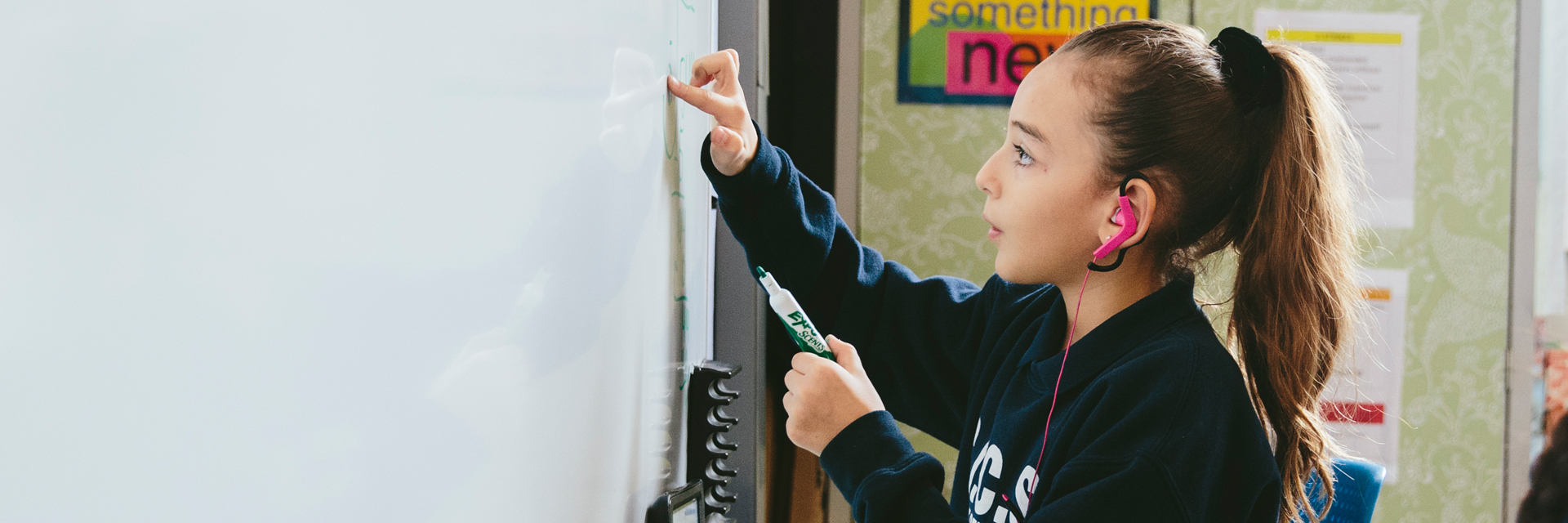 Student at white board