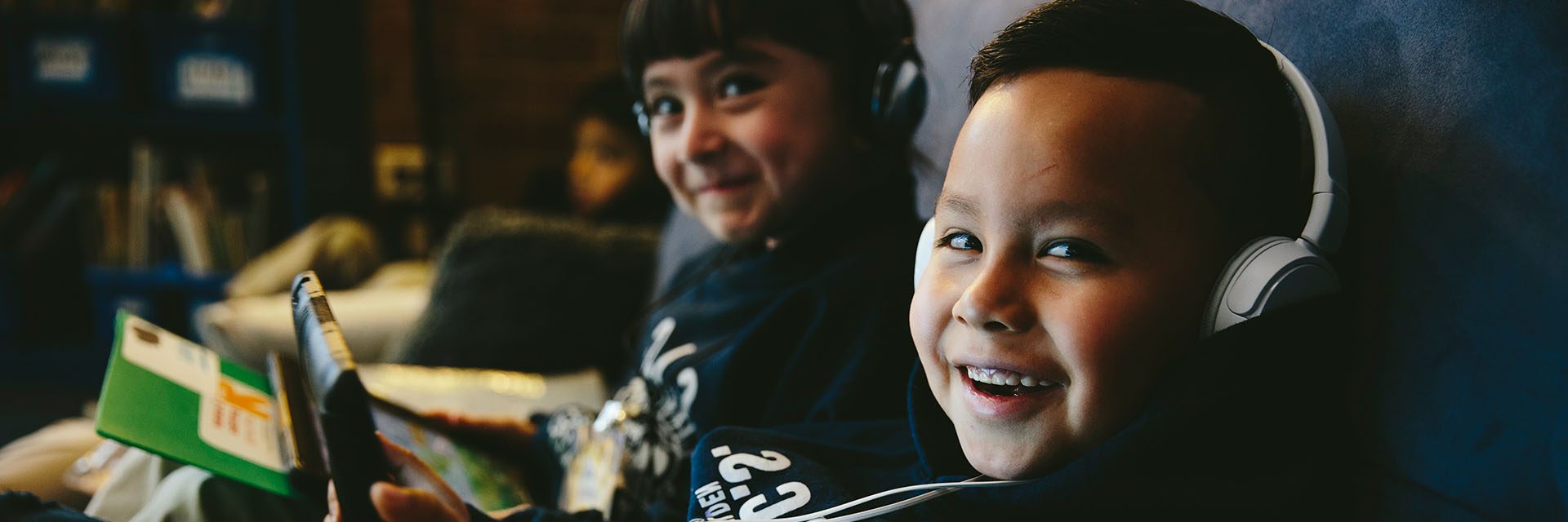 Student smiling with headphones