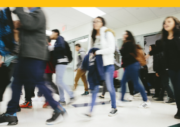 Students walking in hallway.