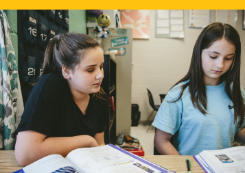 Two students reading.